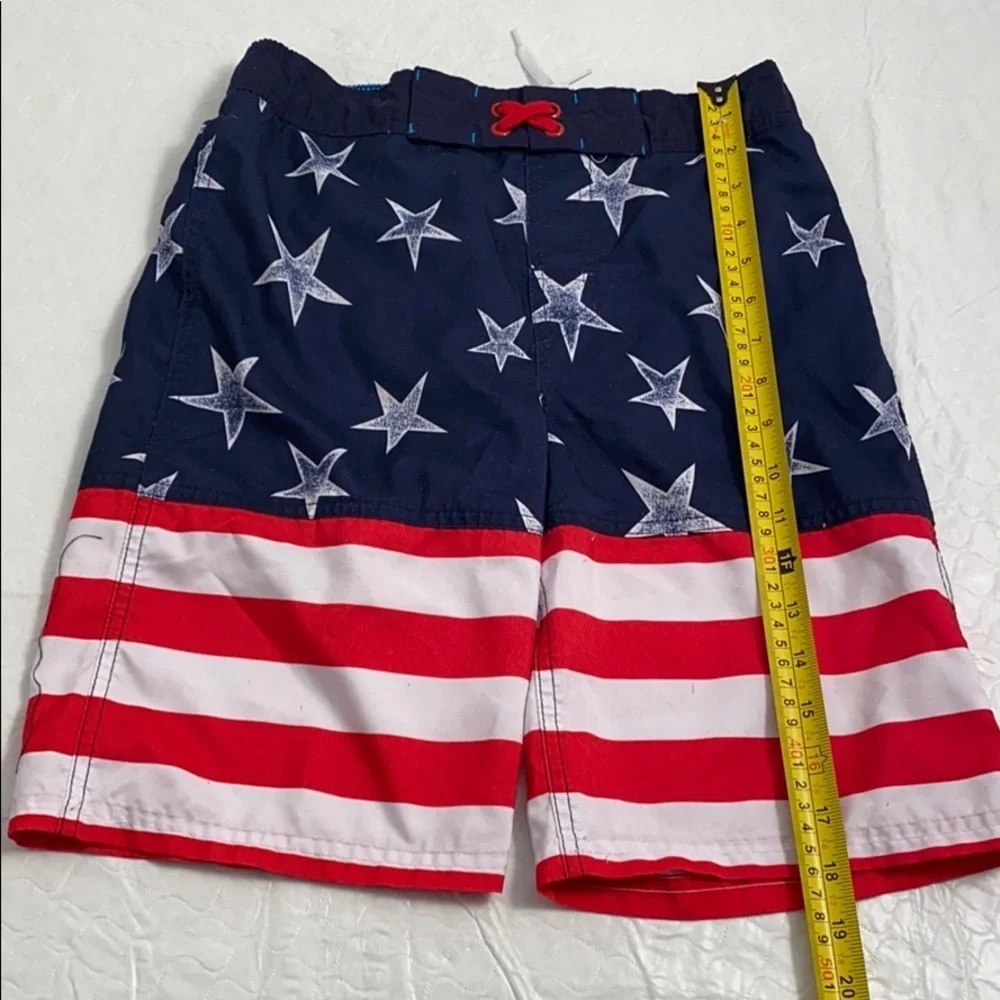 Cat and Jack American Flag red white blue swim trunks L = 12-14